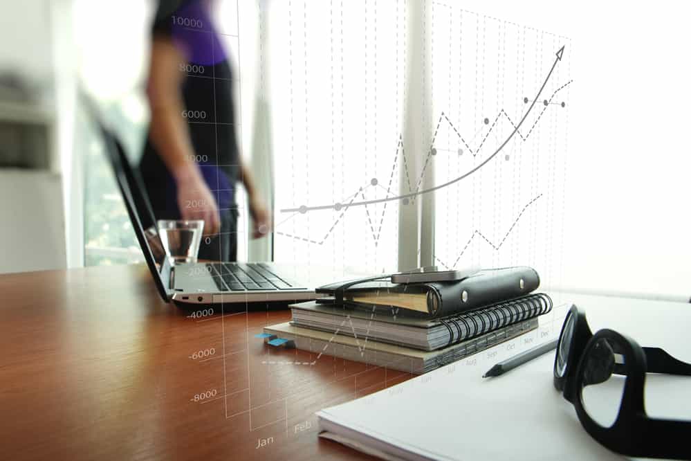 business documents on office table with smart phone and digital tablet 