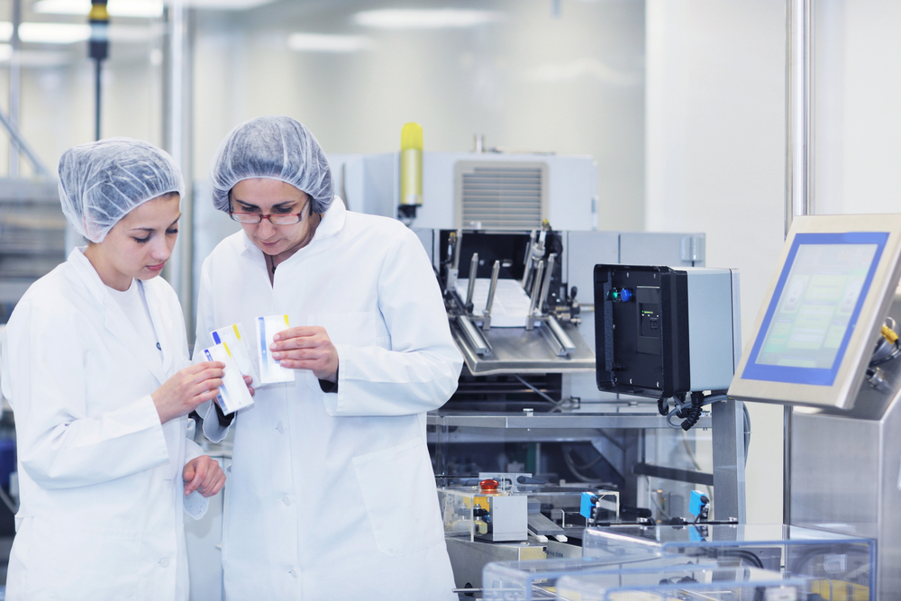 medical staff in discussion while in medical equipment lab